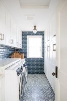 white-laundry-room-with-peacock-blue-tiles